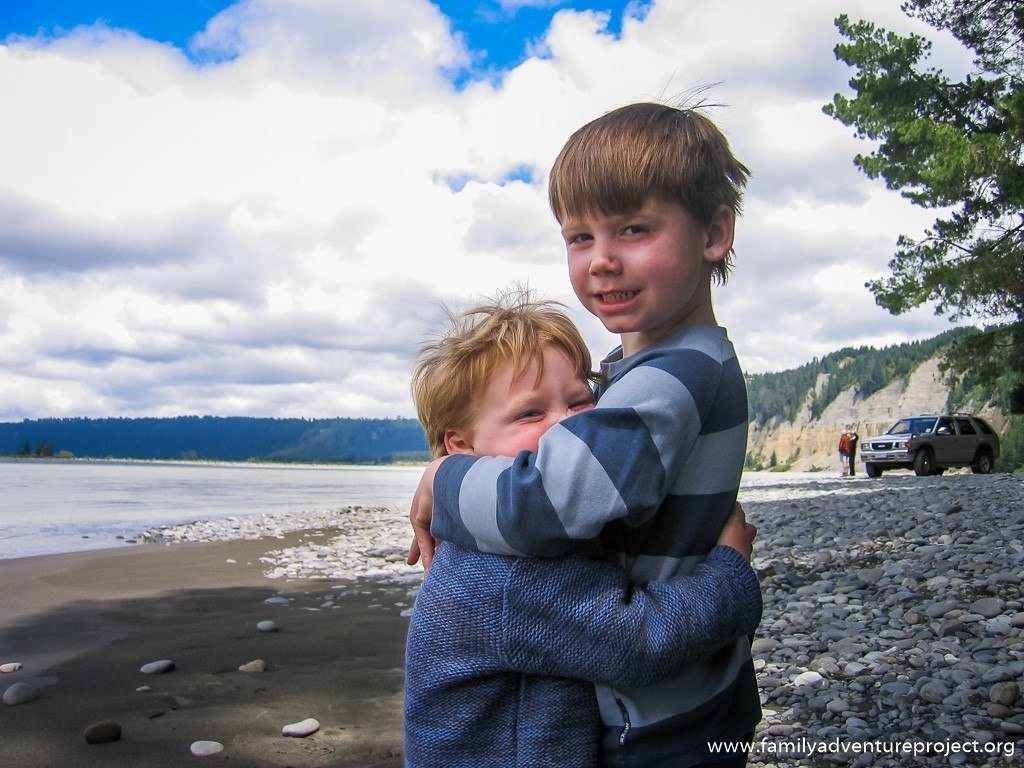 Brothers give each other a hug