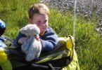 Boy with toy lamb