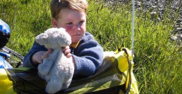 Boy with toy lamb