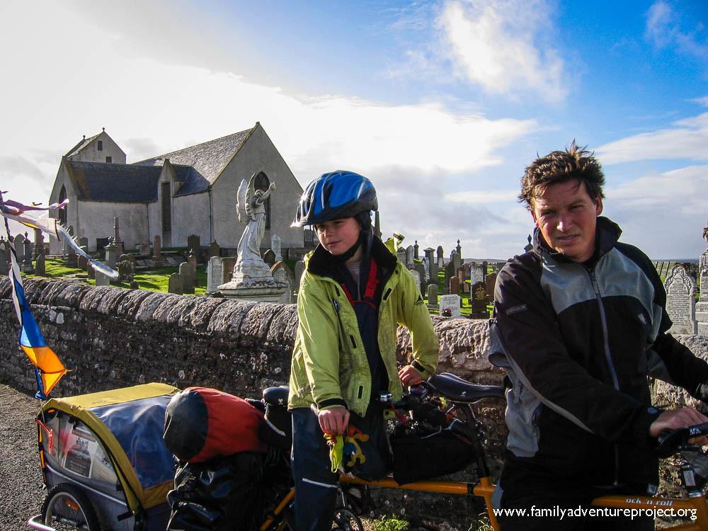 Father and son cycling Caithness Coast Scotland
