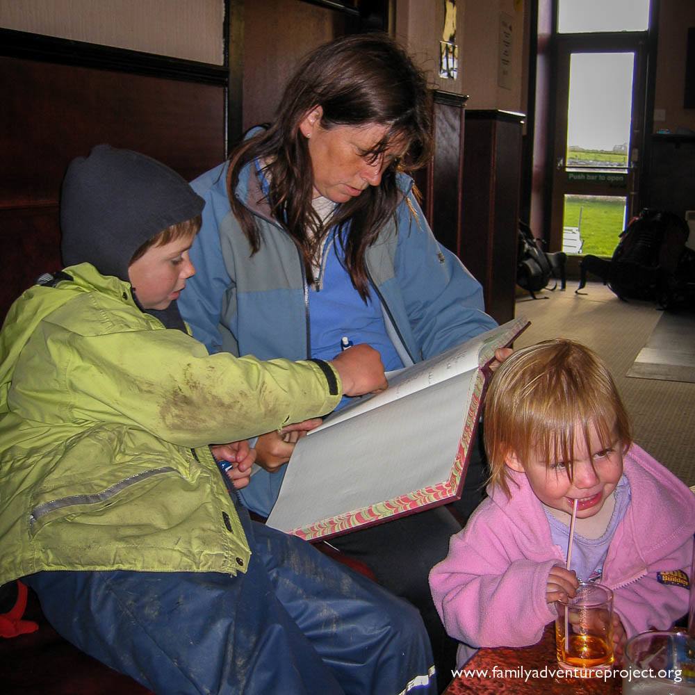 Signing the book of Groaters in the Groats Inn
