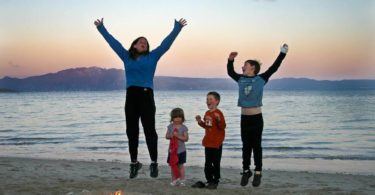 Family celebrating on beach