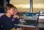 Kids watching DVD on train
