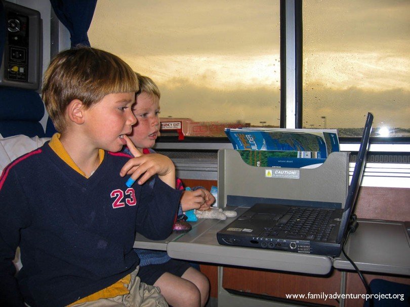 Kids watching DVD on train