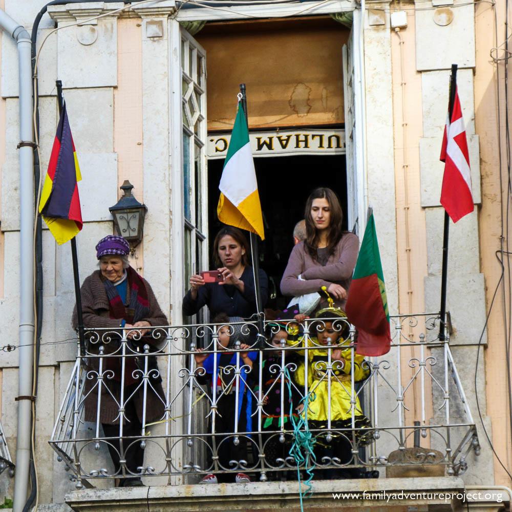 Watching Carnival from Balcony
