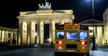 Bus at Brandenburg Gate Berlin