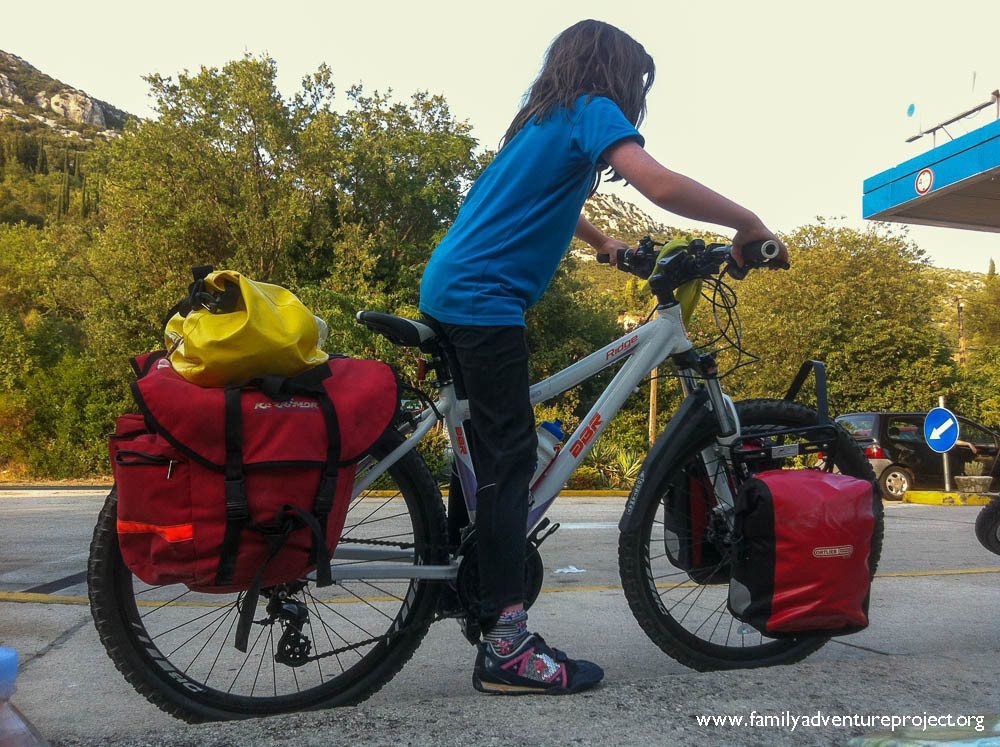 Hannah tests out Cameron's Bike