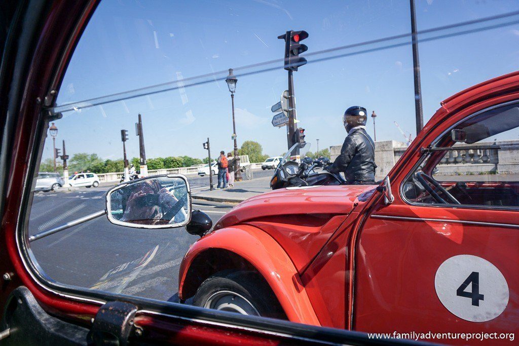 Waiting at the lights in a 2CV in Paris