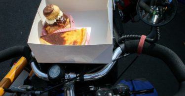 Fresh Cream Cakes on Bicycle Handlebar