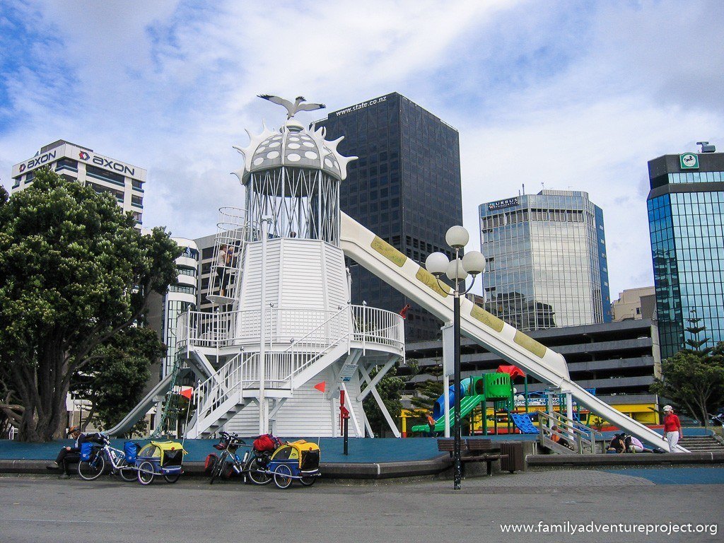 Cyclists resting at Lighthouse in Frank Kitts Waterfront Playground Wellington, New Zealand