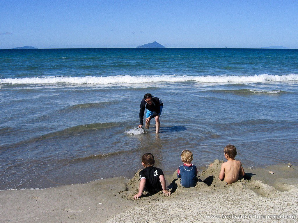 Playing in the sea near Waipu New Zealand