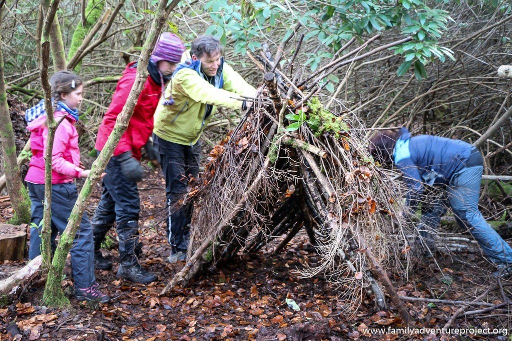Family Building a Shelter on Bear Grylls Survival Academy