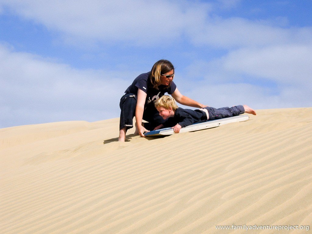 Sand Surfing on Te Paki Sand Dunes New Zealand