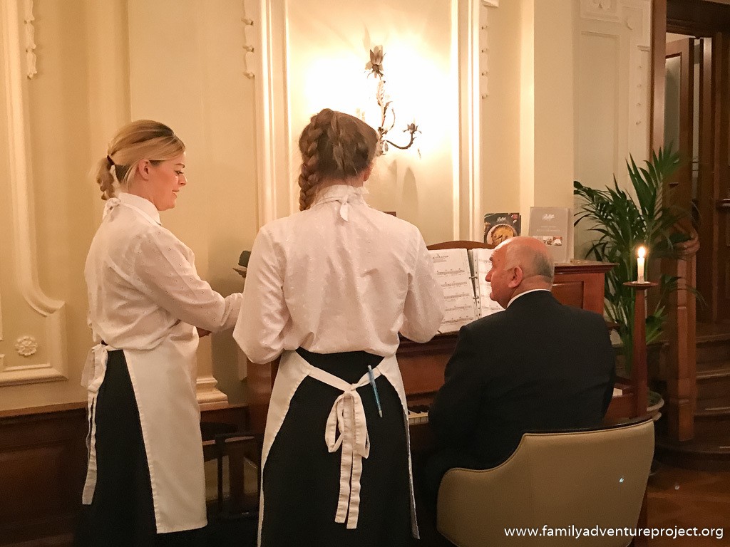 Staff and pianist prepare for service at Bettys Harrogate