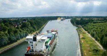 Cargo ships heading towards Kiel on canals